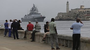 People watch the Russian Navy Admiral Gorshkov frigate arrive at the port of Havana, Cuba, Wednesday, June 12, 2024. People watch the Russian Navy Admiral Gorshkov frigate arrive at the port of Havana, Cuba, Wednesday, June 12, 2024.