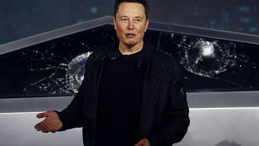 FILE - Tesla CEO Elon Musk introduces the Cybertruck at Tesla's design studio in Hawthorne, Calif., on Nov. 21, 2019. 