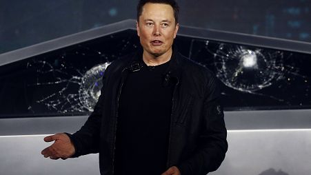 FILE - Tesla CEO Elon Musk introduces the Cybertruck at Tesla's design studio in Hawthorne, Calif., on Nov. 21, 2019. 