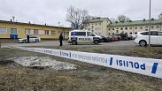 FILE - Police officers stand guard outside Viertola comprehensive school, in Vantaa, Finland, Tuesday, April 2, 2024. 