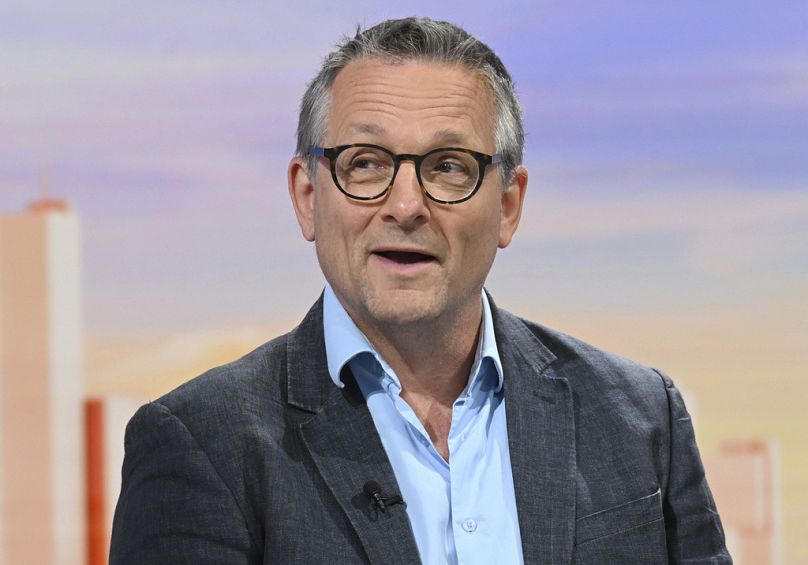 In this undated photo provided by the BBC on Sunday, June 9, 2024, doctor and broadcaster Michael Mosley speaks on Sunday with Laura Kuenssberg. 