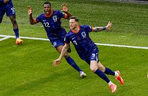 Wout Weghorst of the Netherlands celebrates his goal with his team mates during a Group D match between Poland and the Netherlands at the Euro 2024. Sunday, June 16, 2024