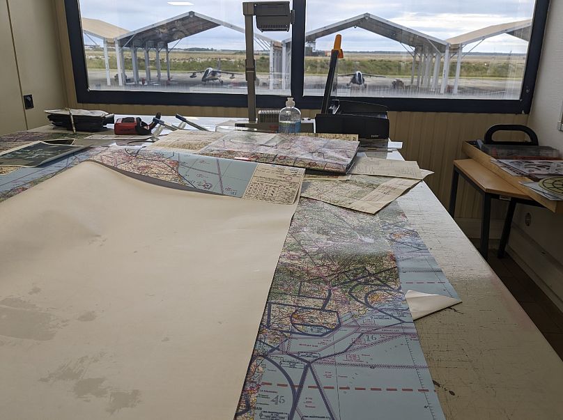 Maps and satellite images are used to by Ukrainian trainees to plot their missions, southwestern France, June 14, 2024.