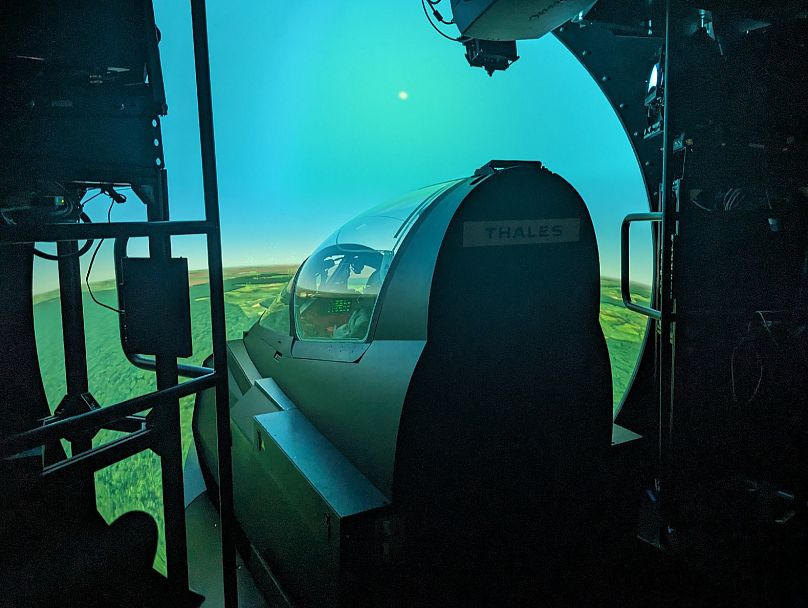 A Ukrainian pilot takes part in a simulator training session in southwestern France, June 14, 2024.