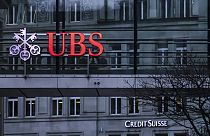 The logos of the Swiss banks Credit Suisse and UBS in Zurich, Switzerland, on March 19, 2023.