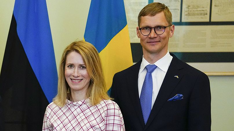 Estonian Prime Minister Kaja Kallas, left, and her husband Arvo Hallik pose for a picture in Tallinn, Estonia, on May 2, 2023.