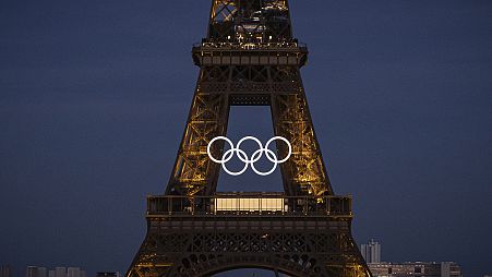 Olympic rings are seen on the Eiffel Tower Friday, June 7, 2024, in Paris. (AP Photo/Aurelien Morissard)