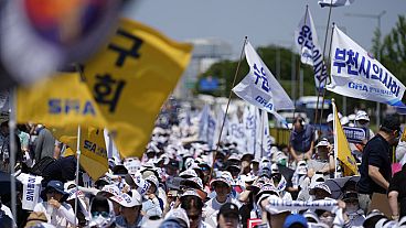 Members of The Korea Medical Association attend at a rally against the government's medical policy in Seoul, South Korea, Tuesday, June 18, 2024. 