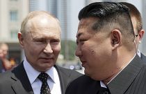 Russian President Vladimir Putin and North Korea's leader Kim Jong Un attend the official welcome ceremony in the Kim Il Sung Square in Pyongyang, 19 June 2024