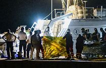 Спасённые в море мигранты доставлены в итальянский порт. 