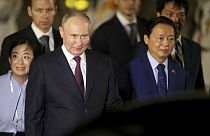 الرئيس الروسي فلاديمير بوتين ونائب رئيس الوزراء الفيتنامي تران هونغ ها