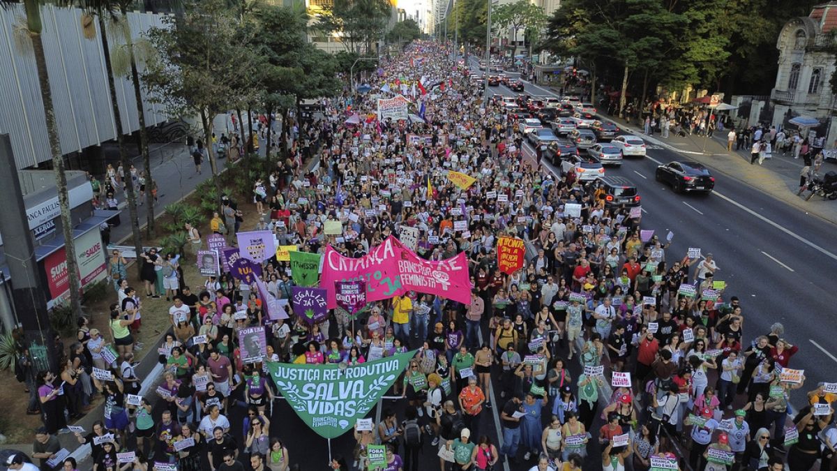 Abortion rights activists march against an anti-abortion congressional bill, along Paulista Avenue in Sao Paulo, Saturday, June 15, 2024.