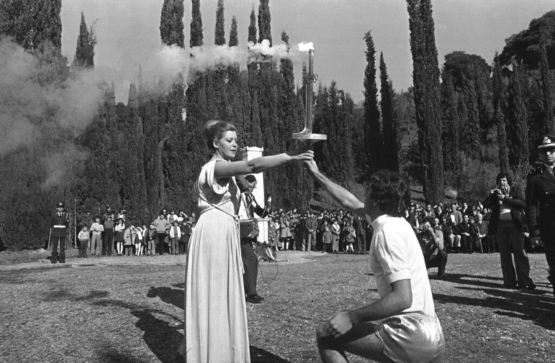 Encendido de la llama olímpica en Olimpia, Grecia, en 1976.