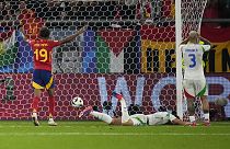 Spain's Lamine Yamal (19) celebrates after Italy's Riccardo Calafiori, center, scored an own goal