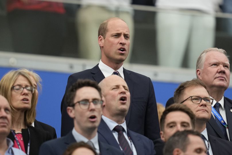 UK's Prince William watches over from the Deutsche Bank Park stands in Frankfurt as England take on Denmark