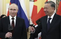الرئيس الروسي فلاديمير بوتين مع الرئيس الجديد تو لام