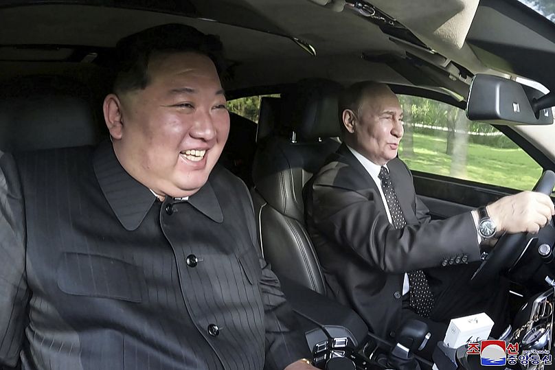 President Putin takes the wheel in a drive with North Korean leader Kim Jong Un  