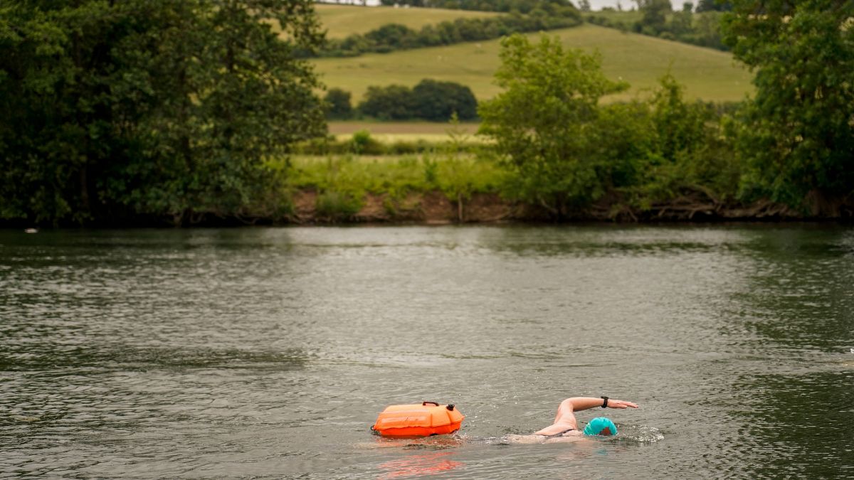 Susan Barry, member of the open water swimming group Henley Mermaids, swims in the river Thames, in Henley-on-Thames.