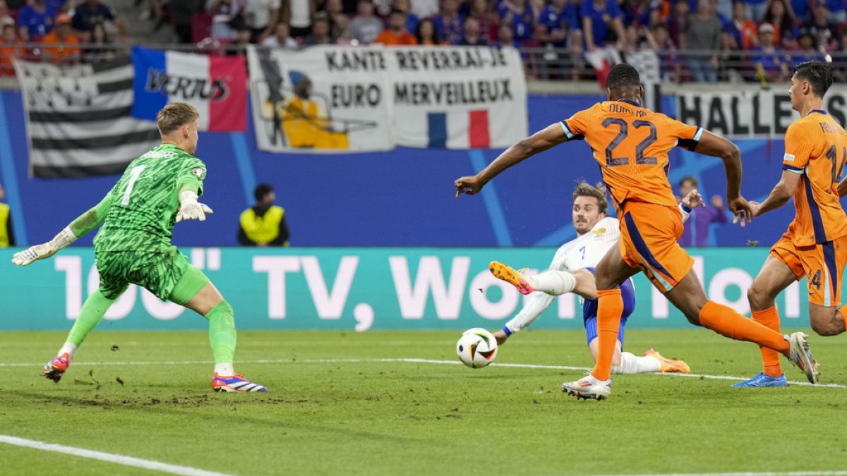 France's Antoine Griezmann misses a good chance from close range against Netherlands