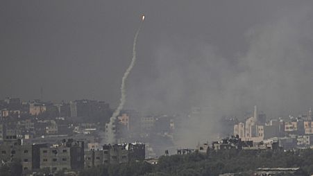 FILE - A rocket launched at Israel from the Gaza Strip is seen misfiring before landing inside Gaza, as seen from southern Israel, Oct. 23, 2023. 