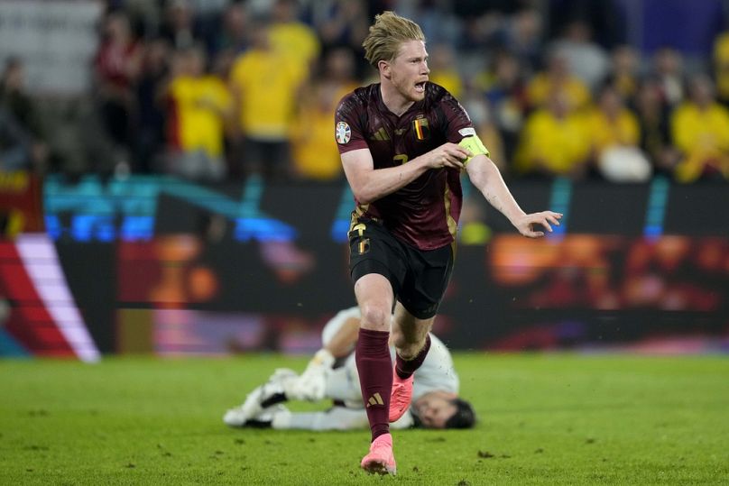 Belgium's Kevin De Bruyne celebrates after scoring his side's second goal during a Group E match between Belgium and Romania at the Euro 2024 soccer tournament in Cologne.