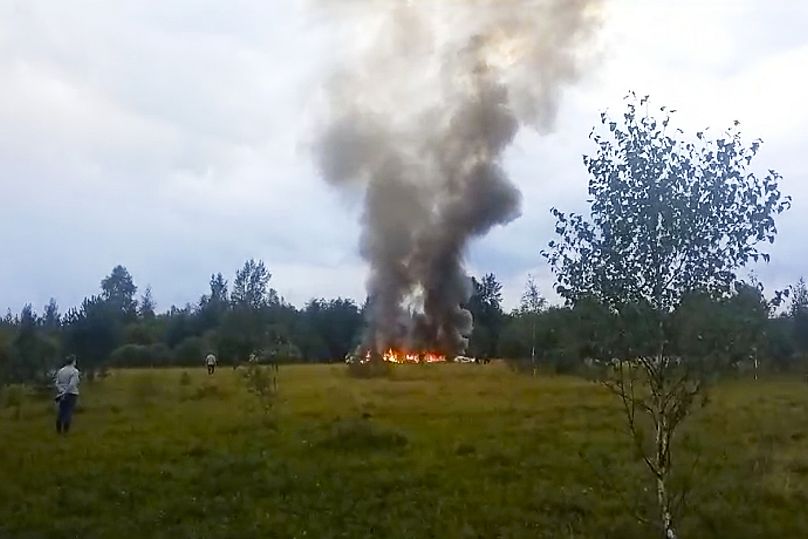 Smoke rises from the crash of a private jet near the village of Kuzhenkino in the Tver region of Russia, on Aug. 23, 2023