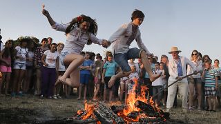 Bonfire jumps are popular celebrations in many places on this day.