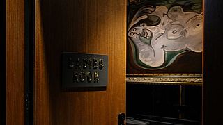 Picasso artwork hanging in Mona gallery women's toilet