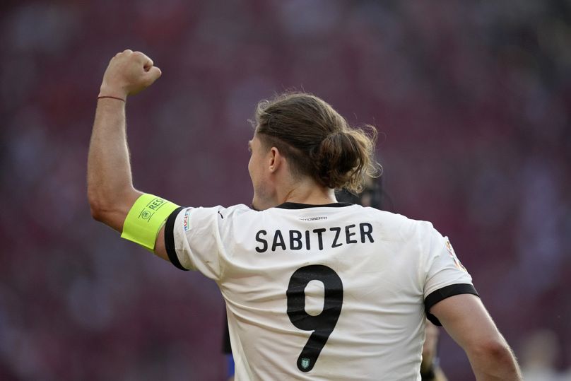 L'Autrichien Marcel Sabitzer célèbre la victoire de son équipe contre les Pays-Bas.