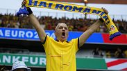 A Romanian fan cheers at the end of Group E match at the Euro 2024