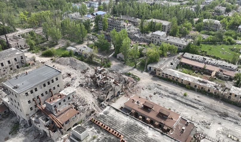 This photo taken from a drone video provided by Ukraine Patrol Police, shows devastation in Chasiv Yar, an eastern Ukrainian city Russia is assaulting, Ukraine, Monday, April 