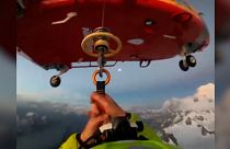 Body camera footage of rescuer descending from helicopter to save three Polish mountaineers 