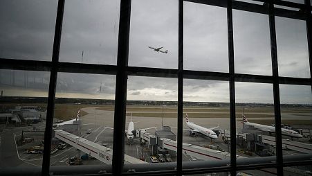 British Airways planes sit parked at Heathrow Airport in London.