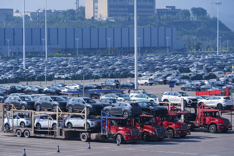 New passenger cars are prepared for transportation at a logistics centre in southwestern China's Chongqing Municipality, October 2023