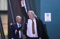 WikiLeaks founder Julian Assange waves after landing at RAAF air base Fairbairn in Canberra, Australia, Wednesday, June 26 2024.