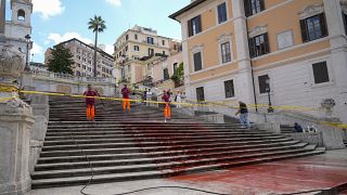 WATCH: Spanish Steps painted red in protest against femicides