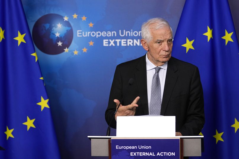 EU foreign policy chief Josep Borrell reads a statement during a media conference prior to talks on Serbia-Kosovo in Brussels, June 26, 2024