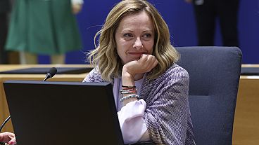 Italy's Prime Minister Giorgia Meloni waits for the start of a round table meeting at an EU summit in Brussels, Thursday, June 27, 2024.