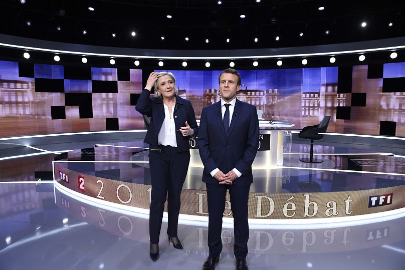 Marine Le Pen (left) and Emmanuel Macron (right) prior to a 2017 debate between the two presidential candidates.