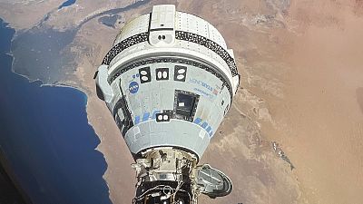 The Starliner spacecraft docked to the Harmony module of the International Space Station, orbiting 262 miles above Egypt's Mediterranean coast, on June 13, 2024. 