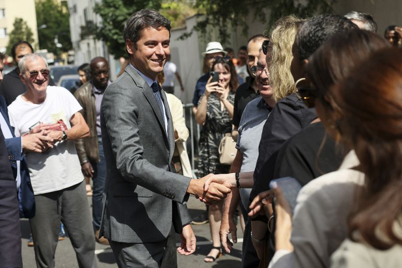 French Prime Minister Gabriel Attal arrives to vote for the first round of parliamentary elections in Vanves, outside Paris, Sunday, June 30, 2024. 