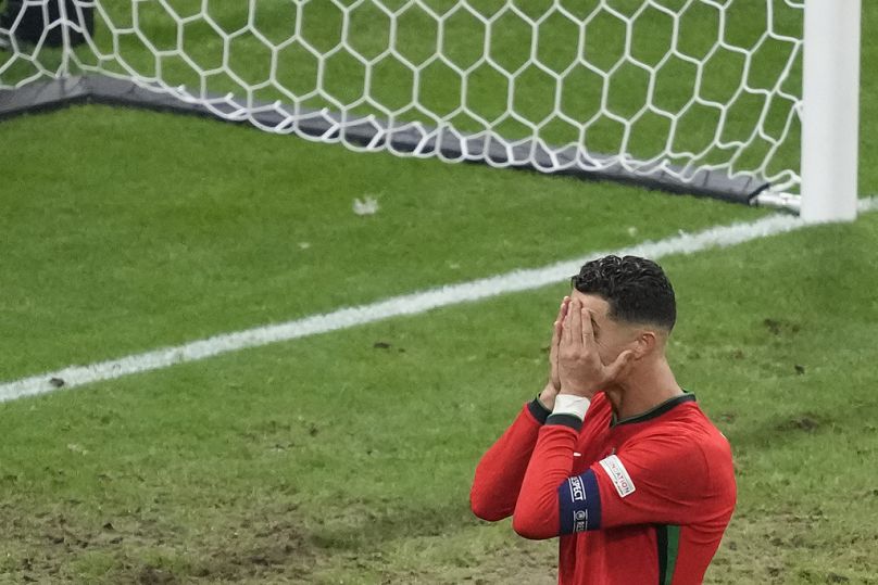 Portugal's Cristiano Ronaldo reacts after missing a chance to score a goal against Slovenia during a round of sixteen match between Portugal and Slovenia 
