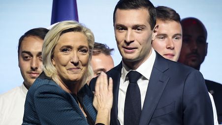 National Rally's Marine Le Pen, left, and Jordan Bardella, right. Their party is one of five using AI in France's snap election. 