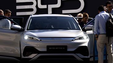 Visitors check the China made BYD ATTO 3 at the IAA motor show in Munich, Germany, on Sept. 8, 2023.