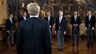 Prime Minister Dick Schoof, third right, is sworn in by Dutch King Willem-Alexander, left, at royal palace Huis ten Bosch in The Hague, 2 July 2024