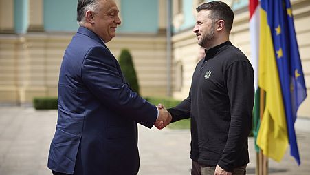 Ukrainian President Volodymyr Zelenskyy, right, welcomes Hungarian Prime Minister Viktor Orban in Kyiv, Ukraine, Tuesday, July 2, 2024.