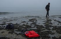 A Kurdish migrant who failed in his attempt to reach the United Kingdom by boat walks back to the town of Ambleteuse, in northern France, on Sunday, May 19, 2024 