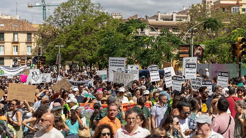 Protesters march against mass tourism in Málaga on 29 July 2024.