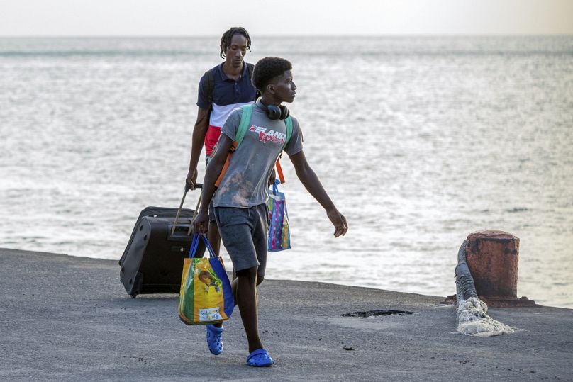 Evacuees from Union Island arrive in Kingstown, St. Vincent and the Grenadines
