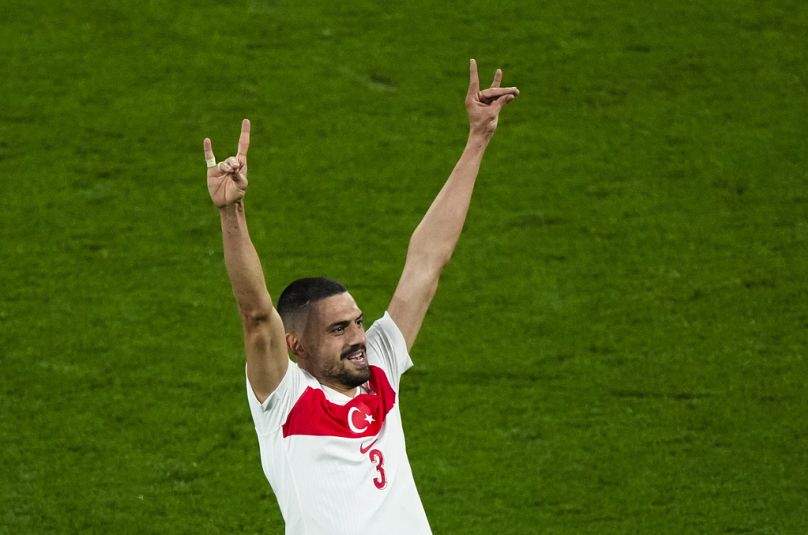 Turkey's Merih Demiral celebrates after scoring his side second goal during a round of sixteen match between Austria and Turkey